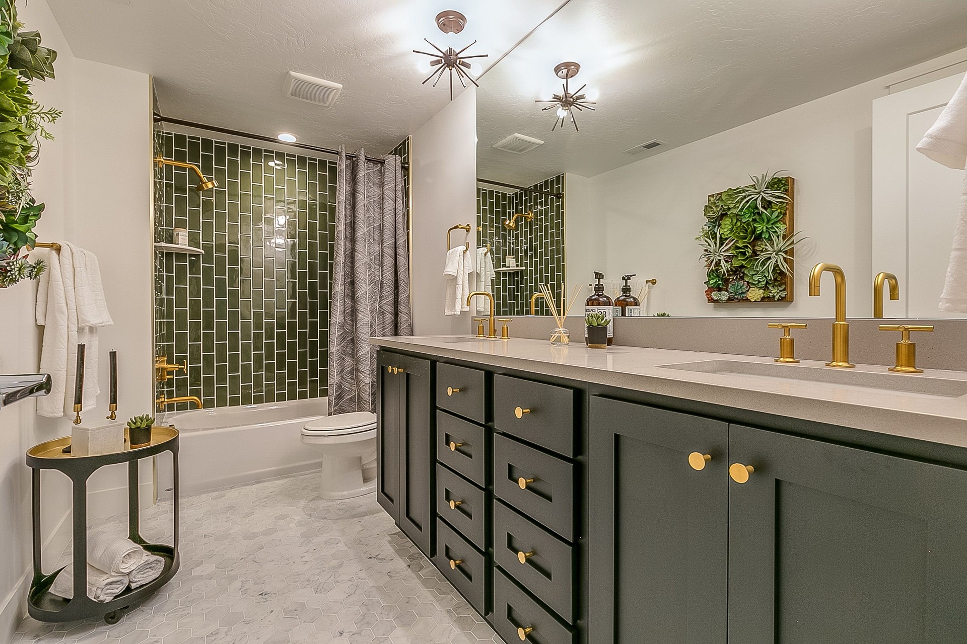 Green tile gives beauty and unique charm to this basement bathroom